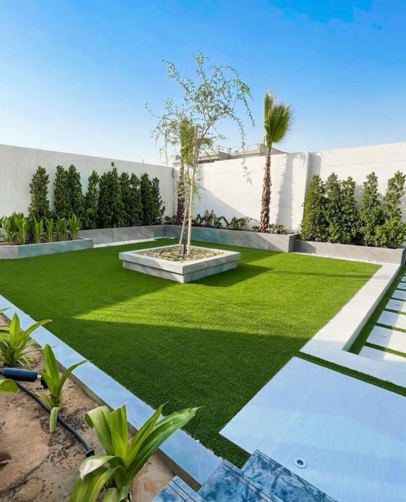 Professional garden maintenance in Al Barsha Dubai with lawn mowing and landscaping services