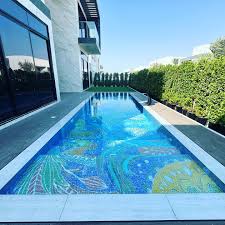 uxury swimming pool tiles installation in Al Furjan Dubai villa pool